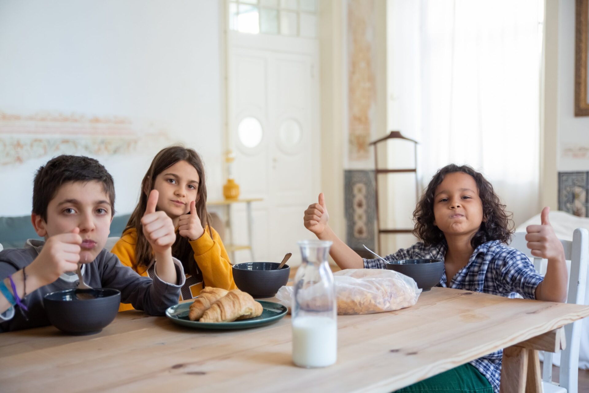 family sitting at table together