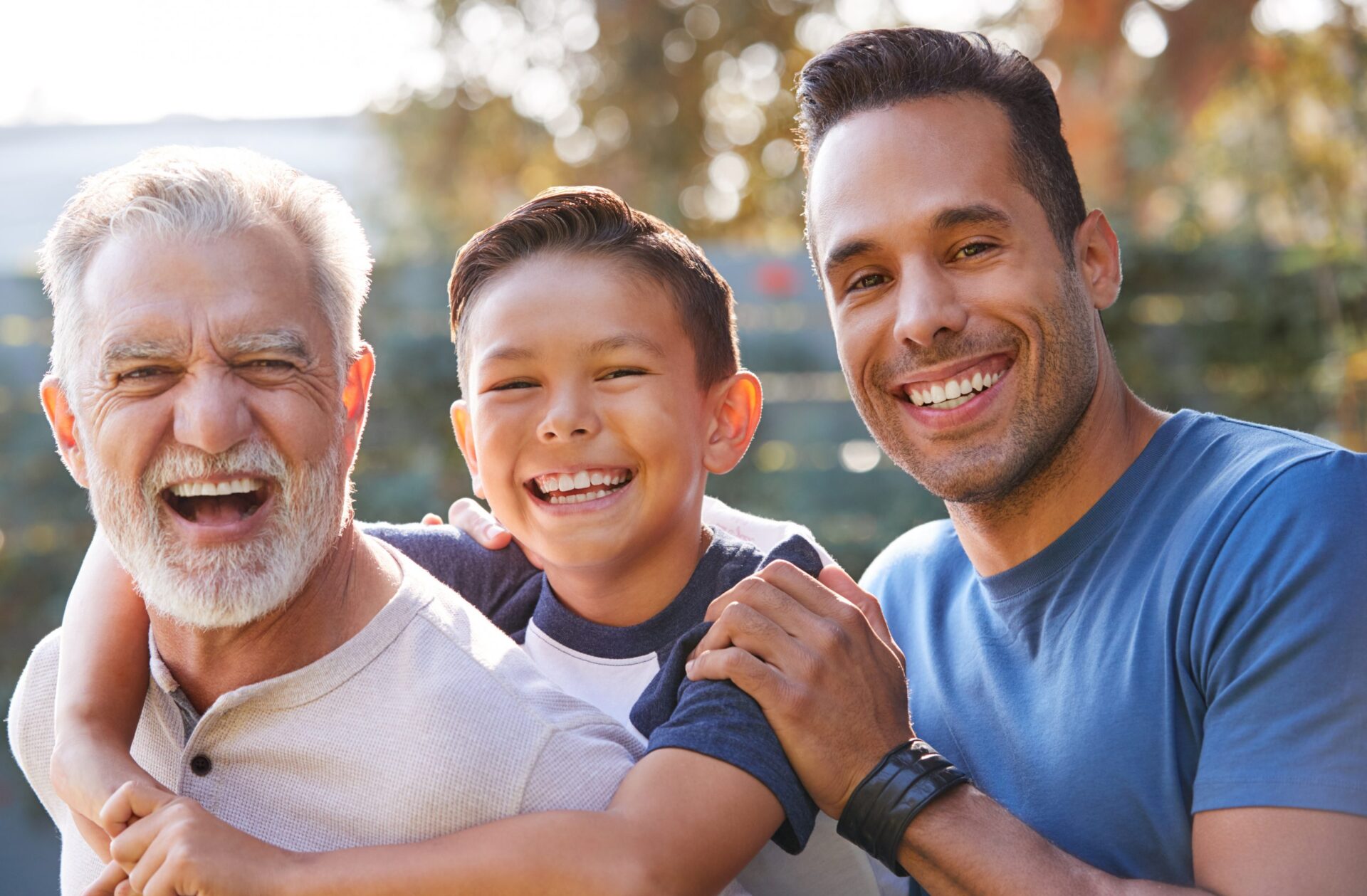 grandfather spending time with son and grandson